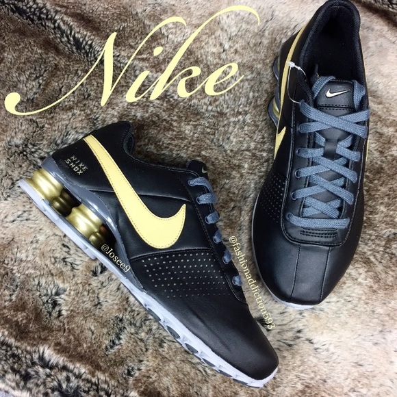 gold nike shox womens
